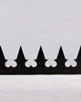 Close-up of precision-cut GIZAGIZA black heart spike – matte finish, ultra-sharp, and beautifully minimalist