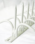White double-bladed Ninja Deterrent™—refined visual deterrent against pigeons, crows, and trespassers