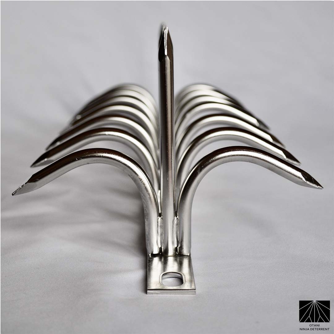 Centered front view of Ninja Deterrent™ double-blade—symmetrical design for premium bird deterrence