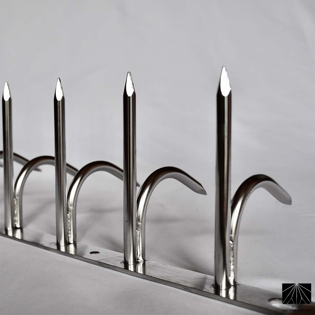 Side profile of double-bladed Ninja Deterrent™—architectural-grade anti-bird and anti-intrusion defense system