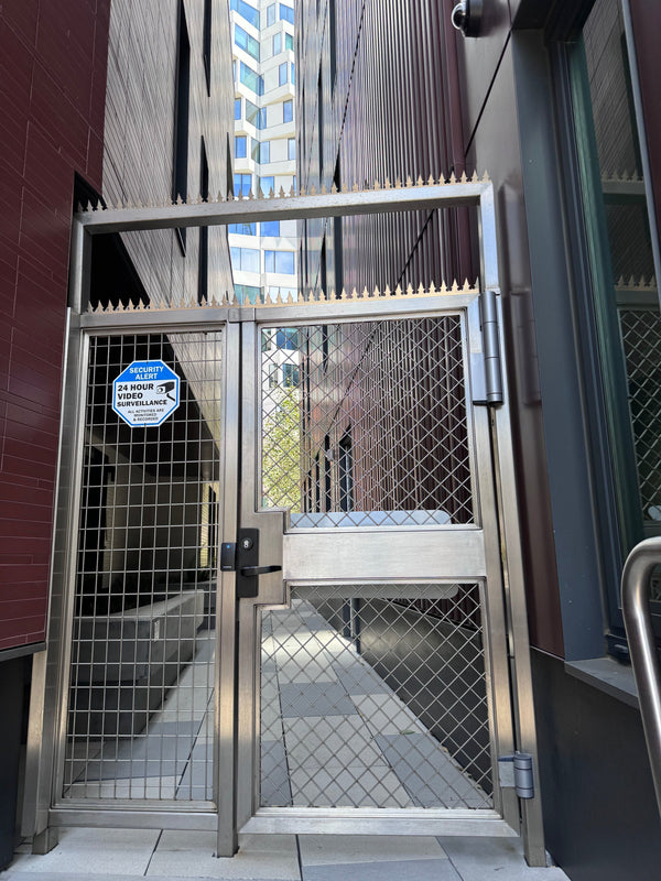 San Francisco Luxury Condominium — Stainless Egress Gate with Anti‑Climb Spikes