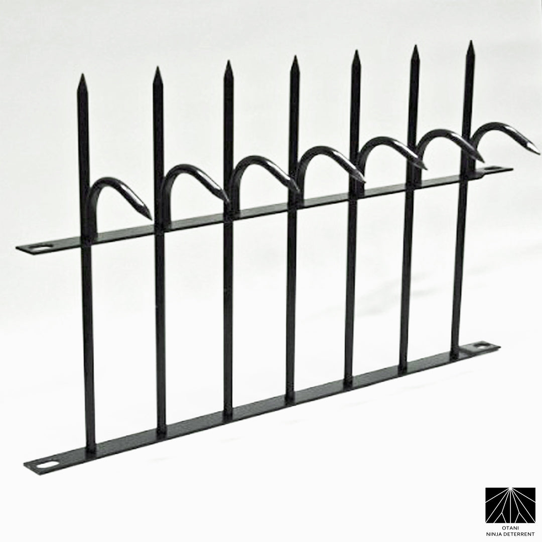 Black powder-coated Ninja Deterrent security spikes for elegant anti-climb protection on fences

