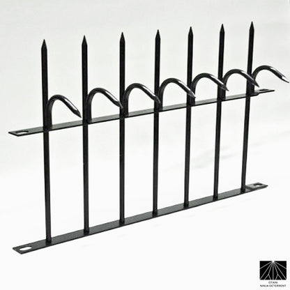 Black powder-coated Ninja Deterrent security spikes for elegant anti-climb protection on fences
