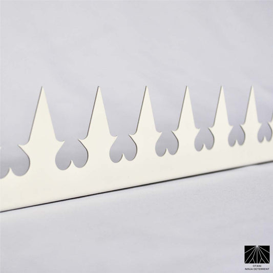 Japanese-made white heart security spike with sharp triangular blades for elegant perimeter and bird deterrence