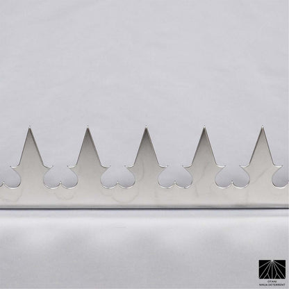 Close-up of precision-cut GIZAGIZA stainless heart spike – matte finish, ultra-sharp, and beautifully minimalist
