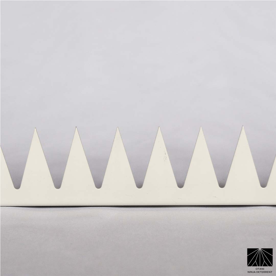 Close-up of precision-cut GIZAGIZA White spike – matte finish, ultra-sharp, and beautifully minimalist
