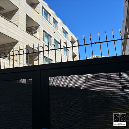Ninja Deterrent anti-climb and bird control spikes on modern residential fence, offering discreet security protection