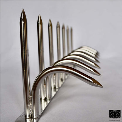 Diagonal angled view of silver double-bladed Ninja Deterrent™—designed for modern perimeter and bird control